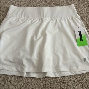 White tennis skirt shorts underneath